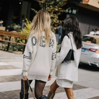 Streetstyle: з чим носити високі чоботи цієї осені