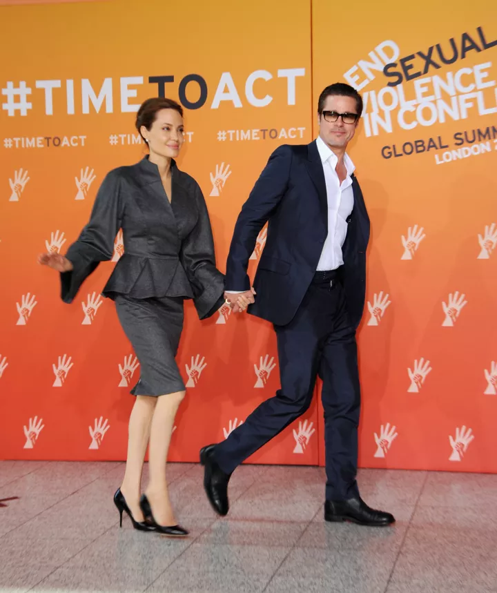 Аджелина Джоли и Бред Питт на саммите в Лондоне, посвященном борьбе против сексуального насилия в зонах военных конфликтов