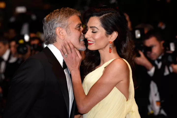 Джордж и Амаль Клуни на 69-м Каннском международном кинофестивале, 2016