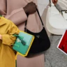Від Galleria до Re-Nylon: історія найкращих сумок Prada