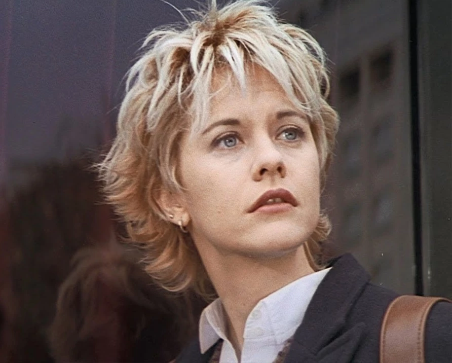 Мег Раян в ролі Кейт у фільмі "Французький поцілунок", 1995, реж. Лоуренс Кездан
