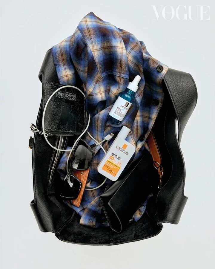 Bag, Saint Laurent; La Roche-Posay products: renewed serum for sensitive skin Hyalu B5 with four types of hyaluronic acid, sunscreen fluid for sensitive skin, Anthelios, UVA400, SPF 50+