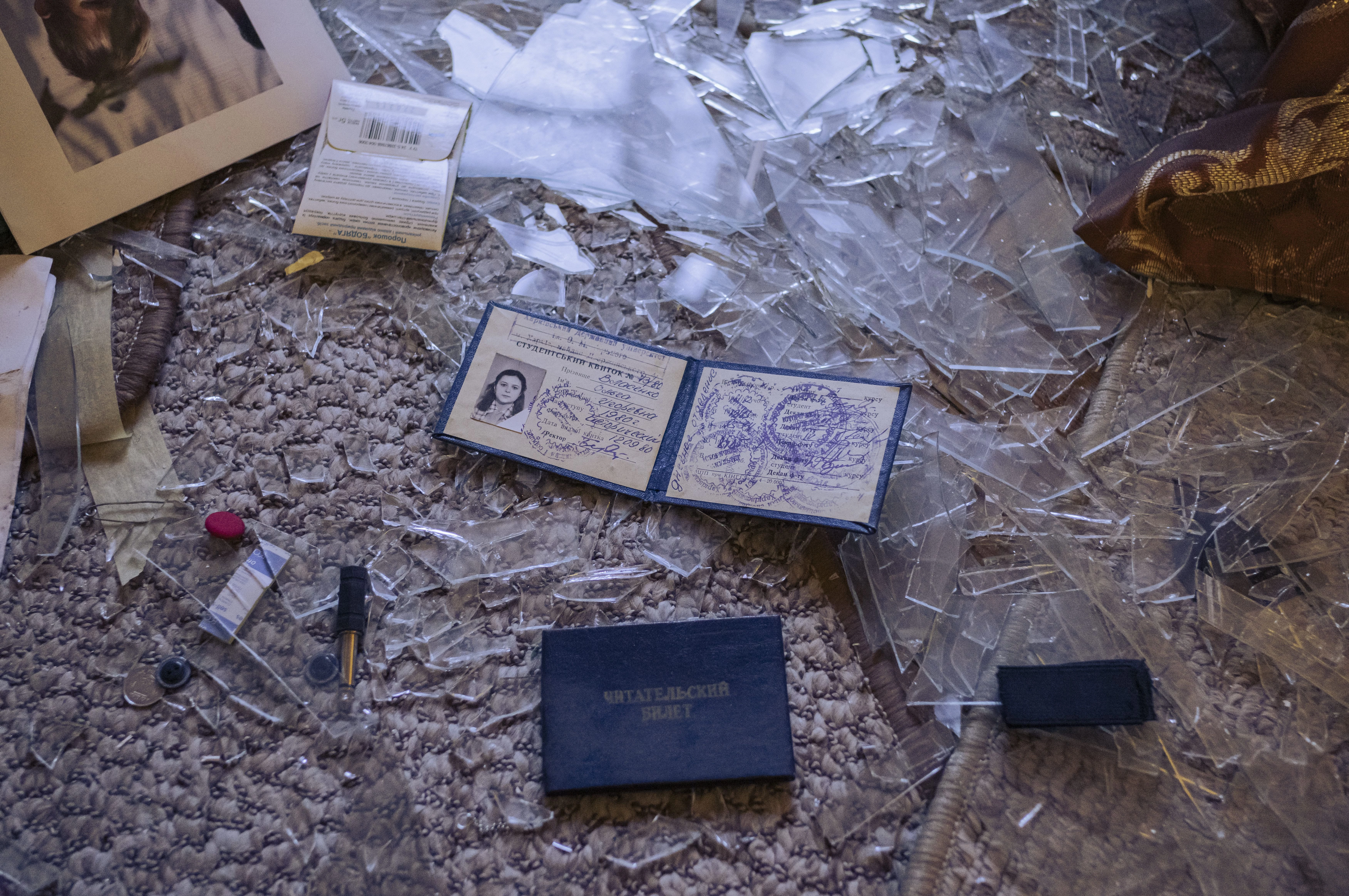 The student ID of the photographer’s mother lies among the debris in her damaged apartment after a Russian shelling attack, July 2025. Photo: Sasha Maslov The student ID of the photographer’s mother lies among the debris in her damaged apartment after a Russian shelling attack, July 2025. Photo: Sasha Maslov